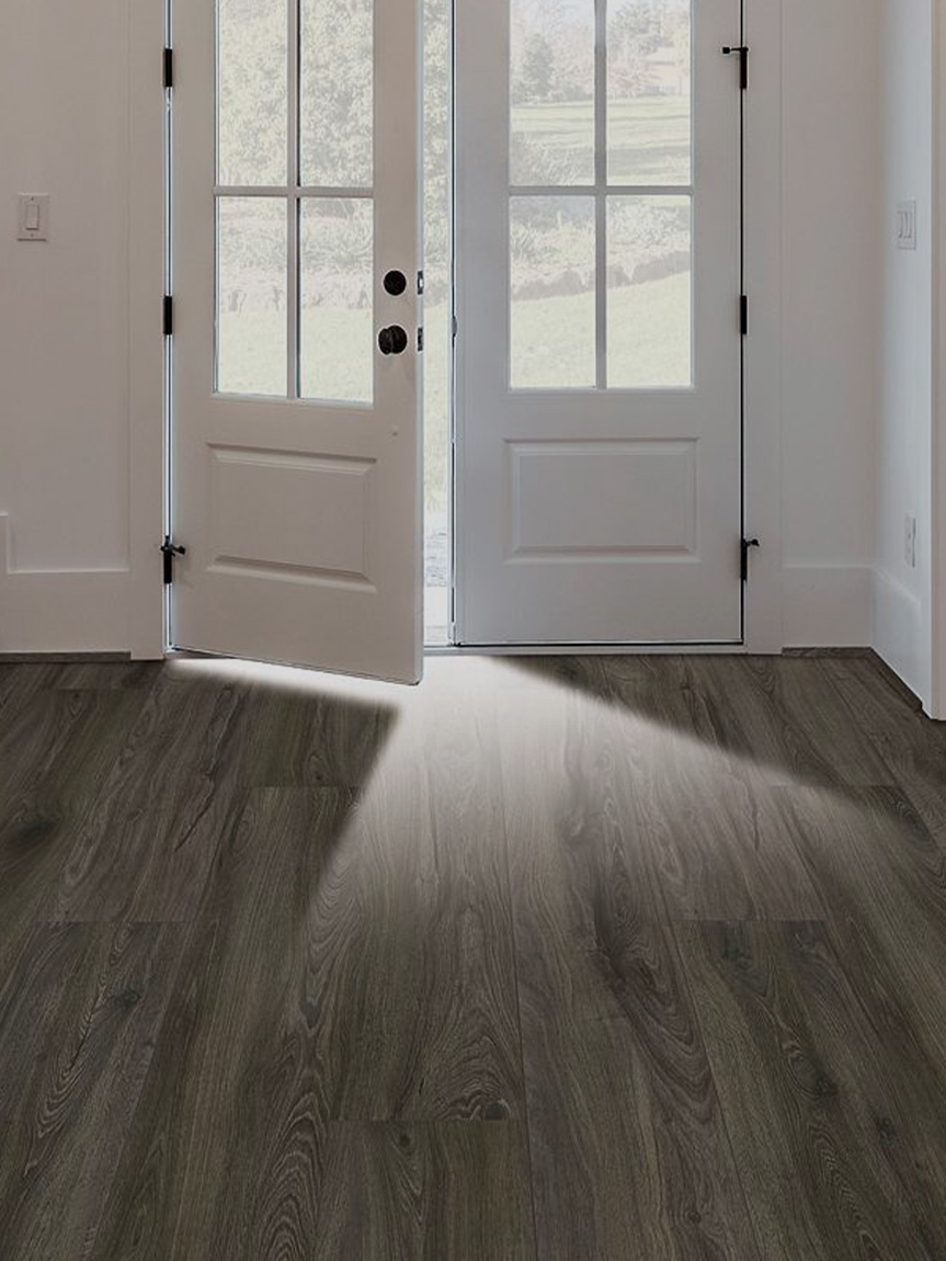 Dad dancing on newly installed hardwood flooring by Flooring America