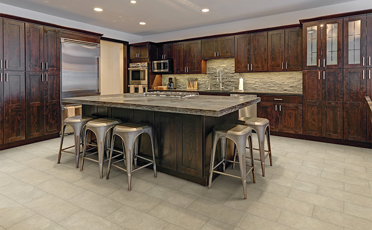 tile flooring in open concept kitchen with large table